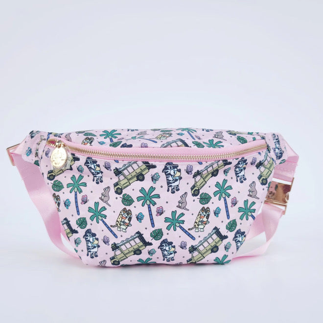 light pink fanny pack bag with Australian character dog, safari bus, butterflies and palm trees