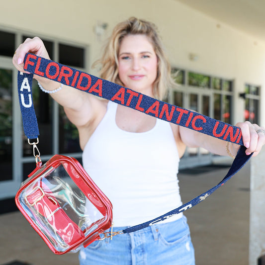 Woman holding a clear bag with a Florida Atlantic University strap
