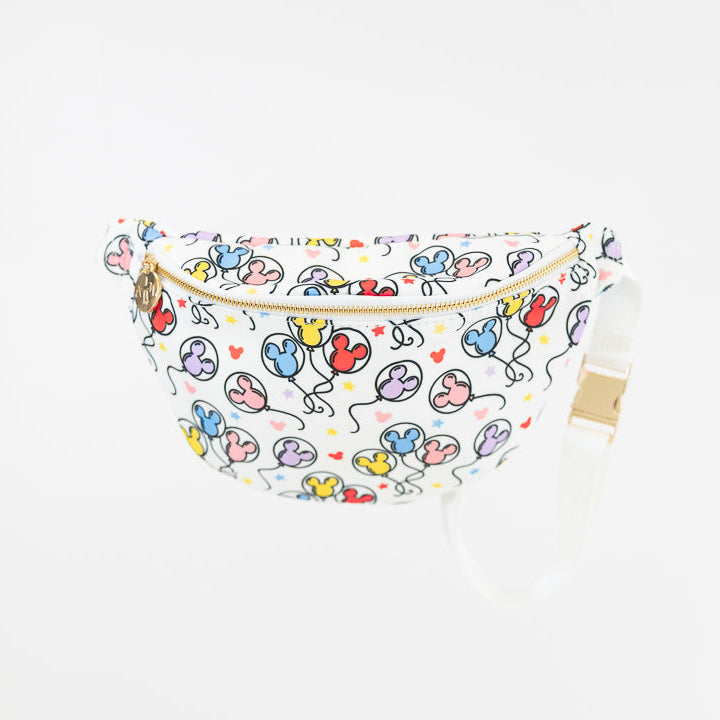 A white fanny pack with a colorful balloon print and a white adjustable strap, shown against a plain white background.