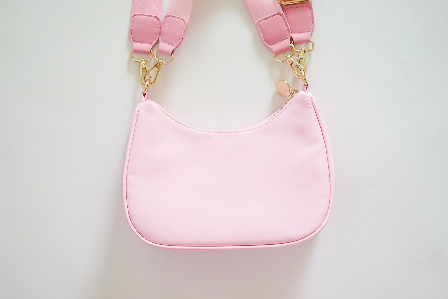 Pink Curved Crossbody Bag