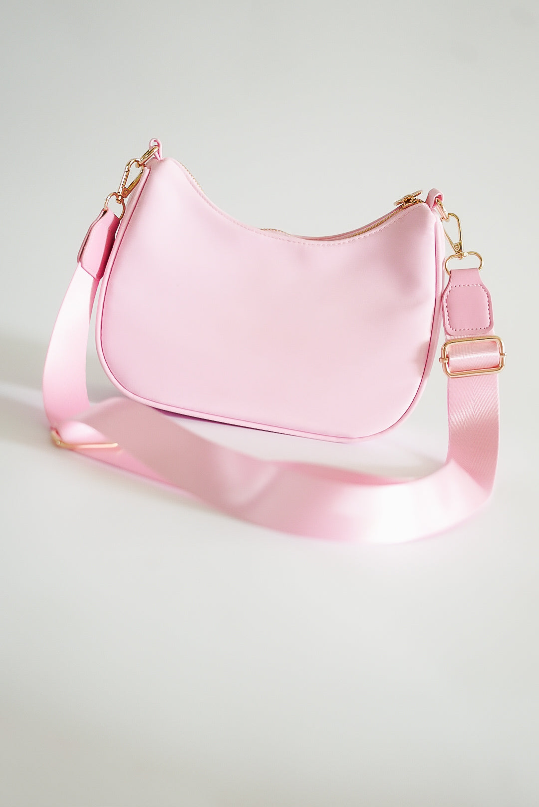 Pink Curved Crossbody Bag
