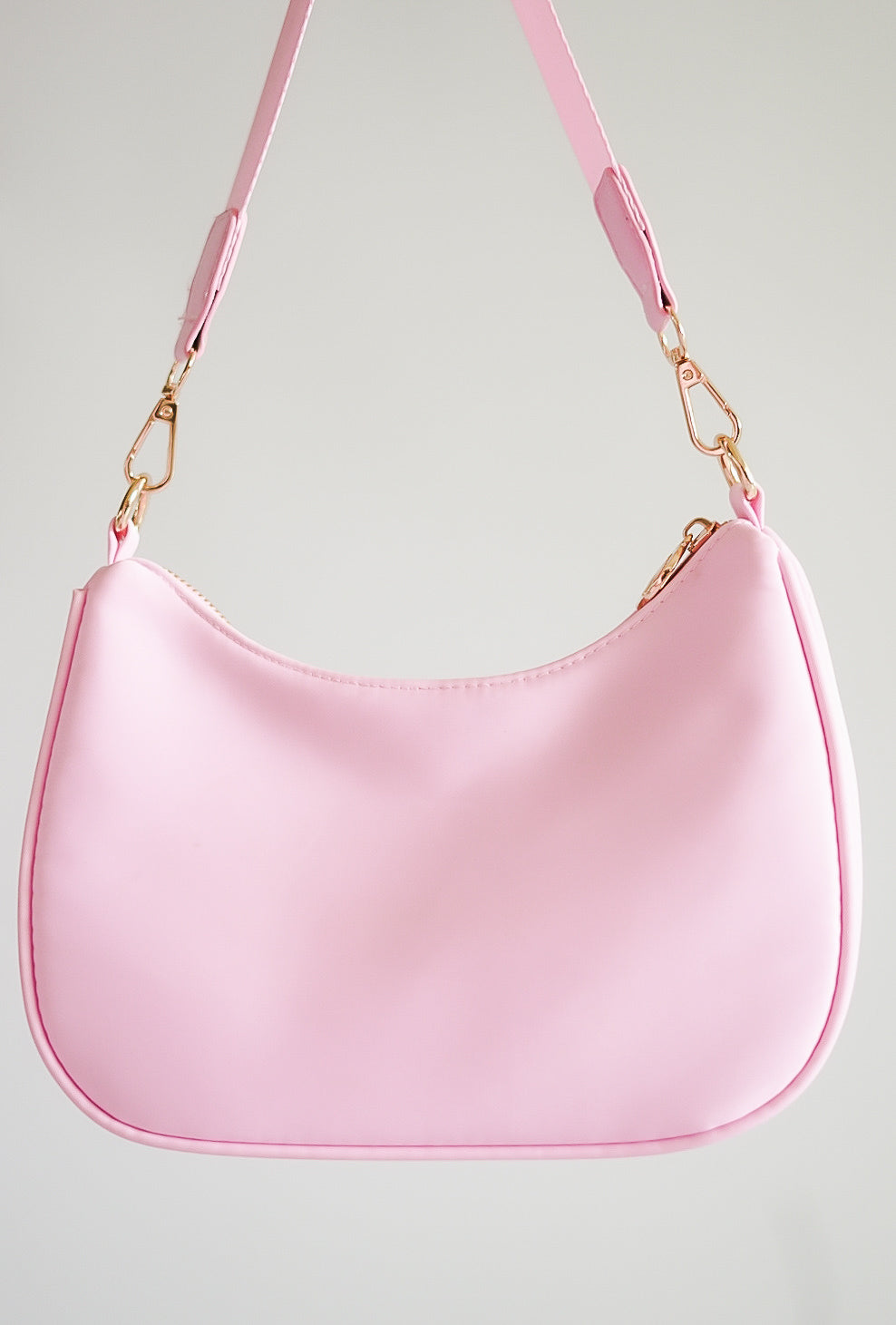 Pink Curved Crossbody Bag