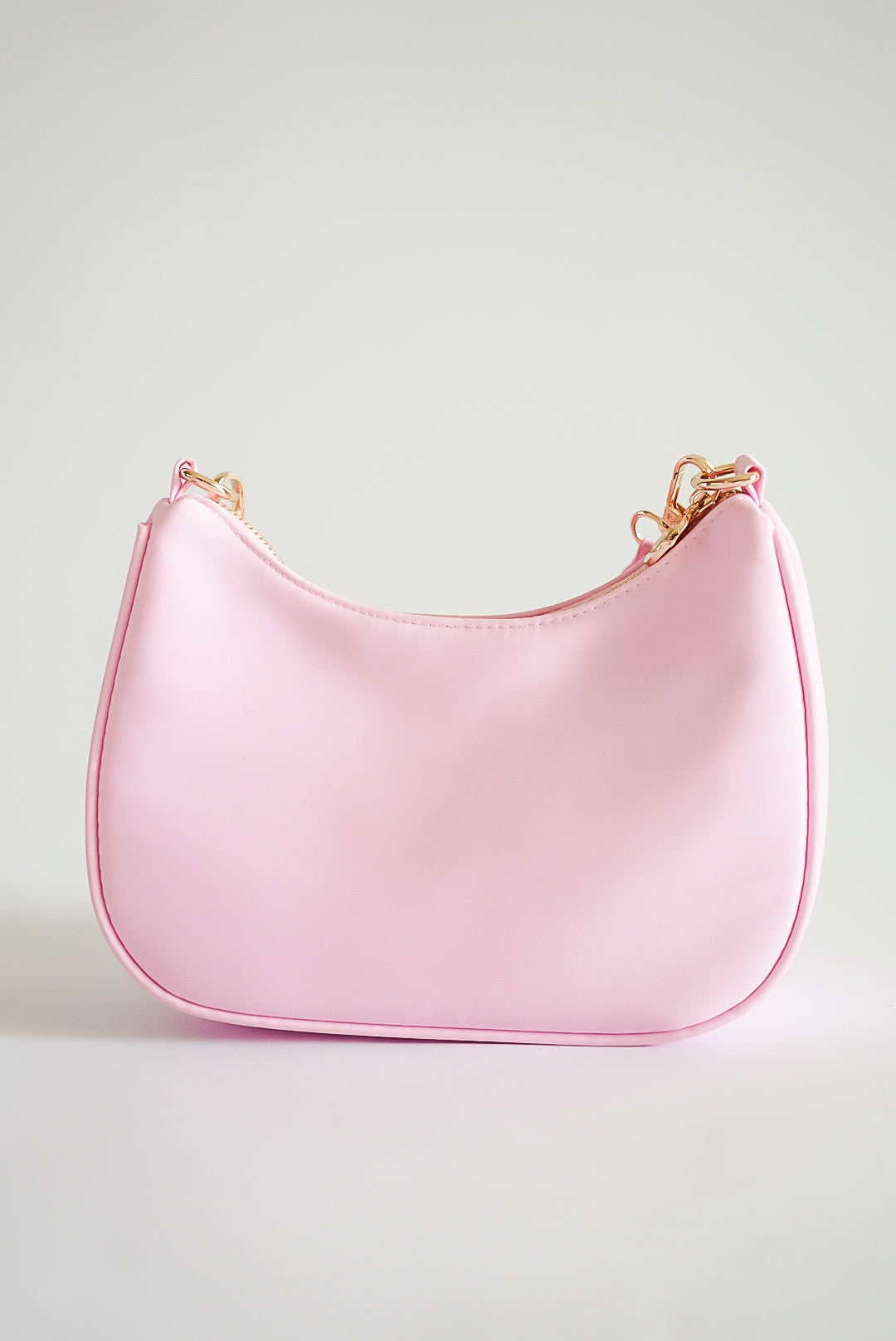 Pink Curved Crossbody Bag