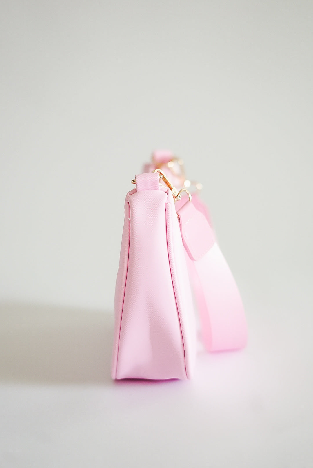 Pink Curved Crossbody Bag