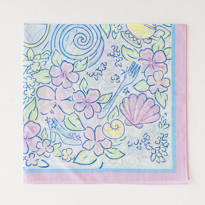 A floral scarf folded into fourths.