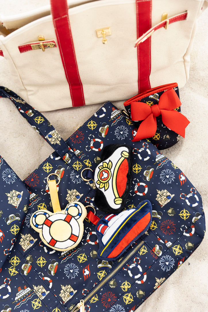 Nautical-themed tote bag with decorative elements on a light background